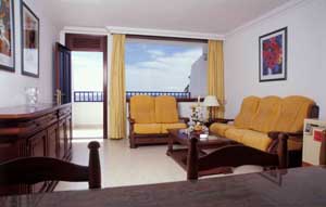 2 person standard apartment and 2 children with garden view, terrace, and an extra bed